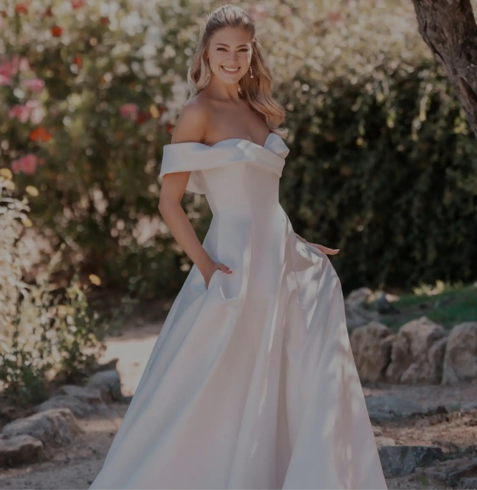 Model wearing white gowns from different bridal collections